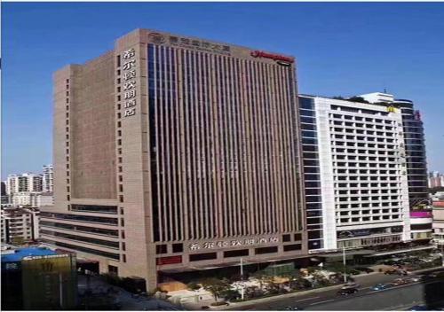 Imagen de la habitación del Hotel Hampton By Hilton Guangzhou Zhujiang New Town. Foto 7