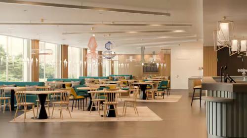 Imagen del bar/restaurante del Hotel Hampton By Hilton Locarno. Foto 1