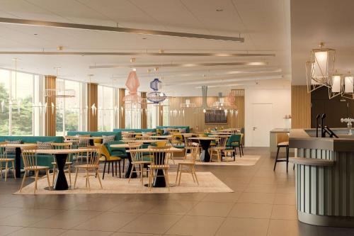 Imagen del bar/restaurante del Hotel Hampton By Hilton Locarno. Foto 2