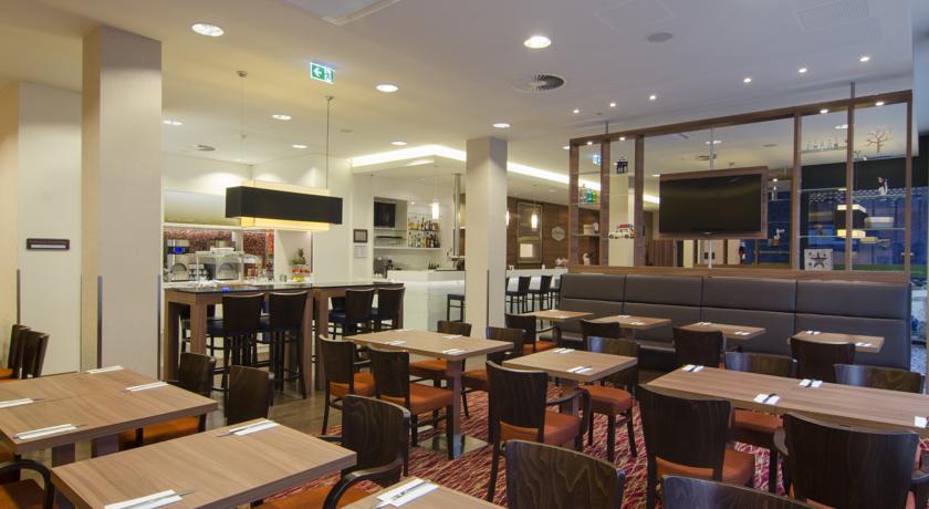 Imagen del bar/restaurante del Hotel Hampton By Hilton Nuremberg City Centre. Foto 2