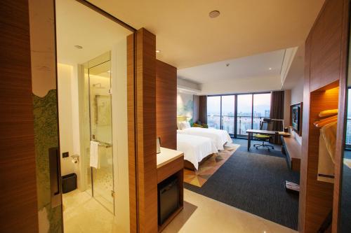 Imagen de la habitación del Hotel Hampton By Hilton Qingyuan Qingxin District. Foto 8