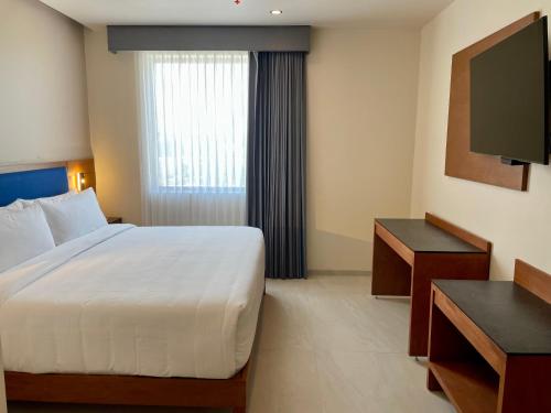 Imagen de la habitación del Hotel Hampton By Hilton Queretaro Juriquilla. Foto 2