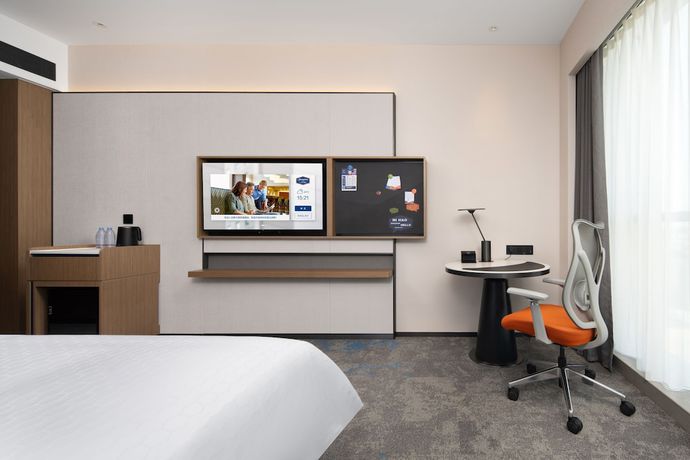 Imagen de la habitación del Hotel Hampton By Hilton Renhe Baiyun Airport. Foto 11