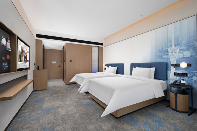 Imagen de la habitación del Hotel Hampton By Hilton Renhe Baiyun Airport. Foto 13