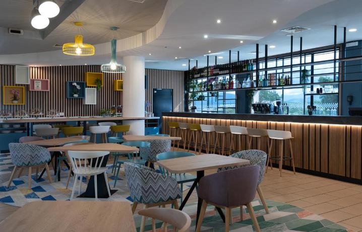 Imagen del bar/restaurante del Hotel Hampton By Hilton Rome North Fiano Romano. Foto 3