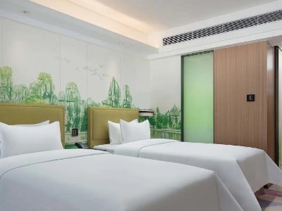 Imagen de la habitación del Hotel Hampton By Hilton Sanqiao Subway Station. Foto 8