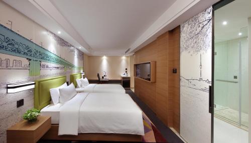 Imagen de la habitación del Hotel Hampton By Hilton Wuhan Tianhe Airport East. Foto 7