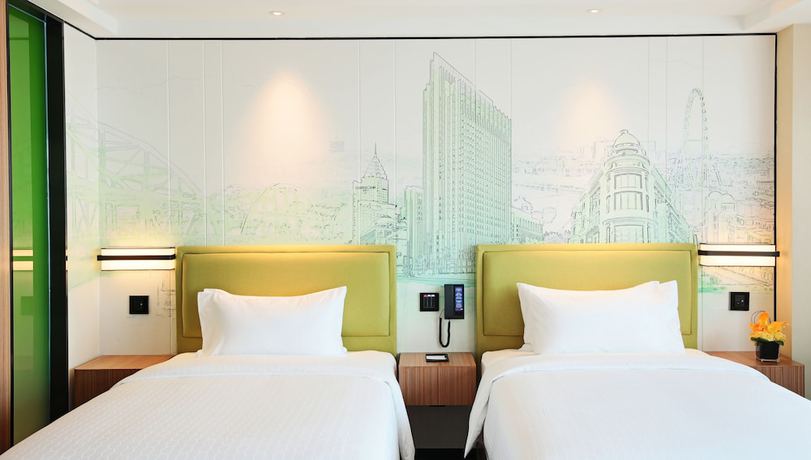 Imagen de la habitación del Hotel Hampton By Hilton Zhongshan Nanlang. Foto 11