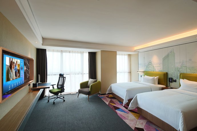 Imagen de la habitación del Hotel Hampton By Hilton Zhongshan Nanlang. Foto 12