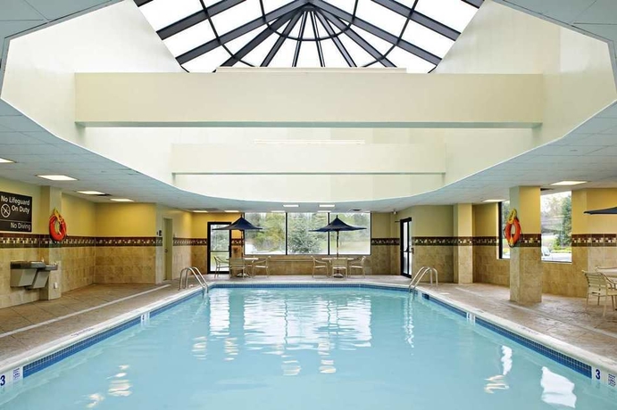 Imagen de la piscina del Hotel Hampton Inn Brookhaven Long Island. Foto 15