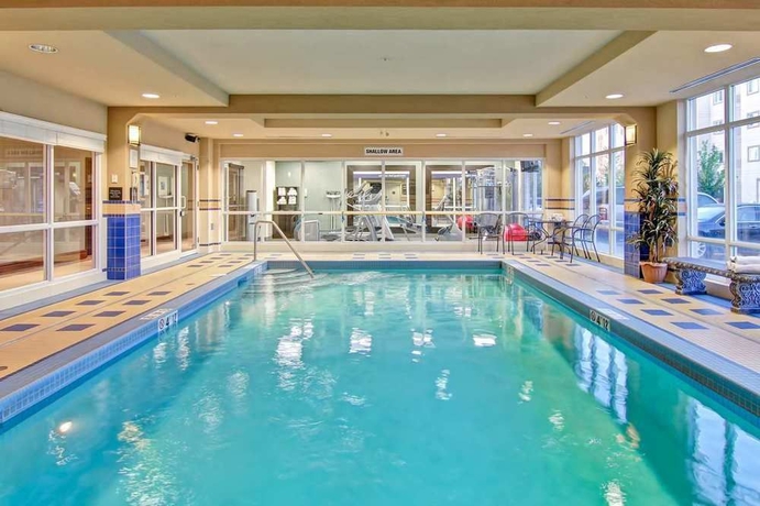 Imagen de la piscina del Hotel Hampton Inn By Hilton London. Foto 16