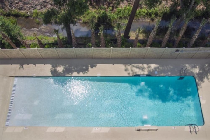 Imagen de la piscina del Hotel Hampton Inn Gulf Shores. Foto 19