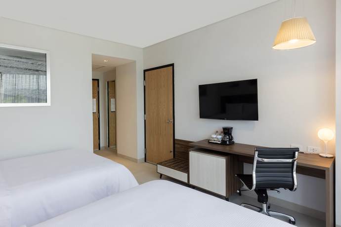 Imagen de la habitación del Hotel Hampton Inn by Hilton Cancun Cumbres. Foto 11