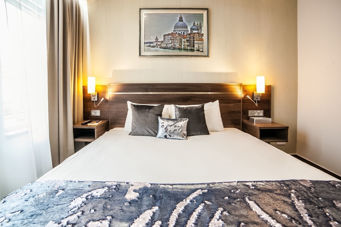 Imagen de la habitación del Hotel Hampton Suites Serviced Apartments. Foto 4