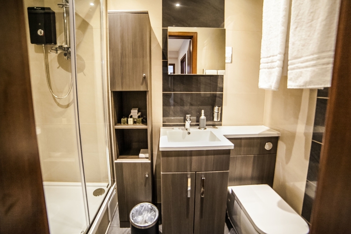 Imagen de la habitación del Hotel Hampton Suites Serviced Apartments. Foto 6