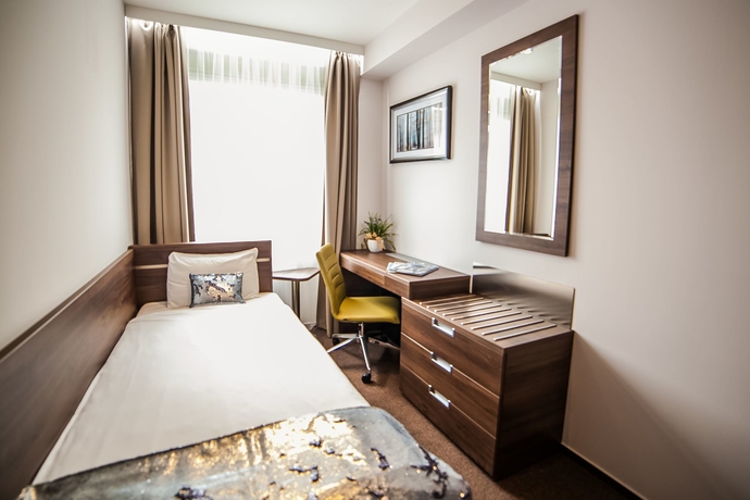 Imagen de la habitación del Hotel Hampton Suites Serviced Apartments. Foto 10