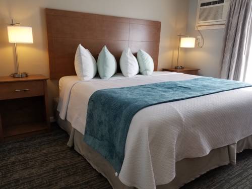 Imagen de la habitación del Hotel Hampton Village Inn. Foto 10