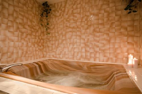 Imagen de la habitación del Hotel Hampton Village Inn. Foto 14