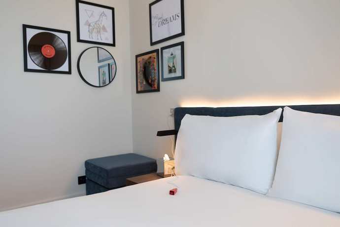 Imagen de la habitación del Hotel Hampton by Hilton Ashford International. Foto 16