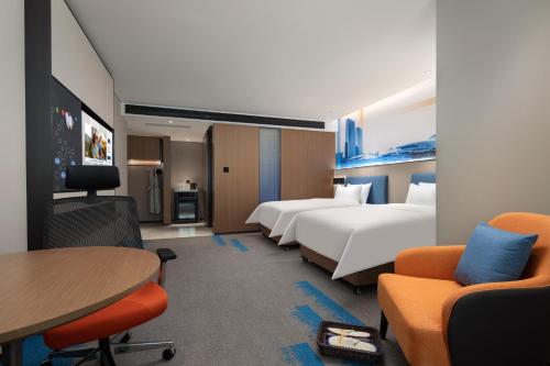 Imagen de la habitación del Hotel Hampton by Hilton Changsha Wuyi Square. Foto 9