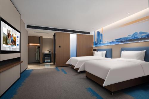Imagen de la habitación del Hotel Hampton by Hilton Changsha Wuyi Square. Foto 10