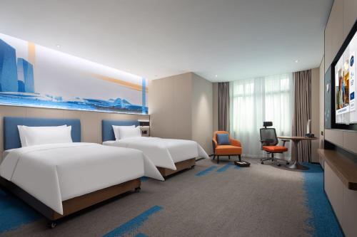 Imagen de la habitación del Hotel Hampton by Hilton Changsha Wuyi Square. Foto 11