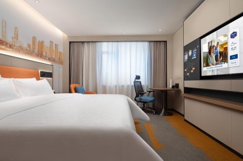 Imagen de la habitación del Hotel Hampton by Hilton Changsha Wuyi Square. Foto 12