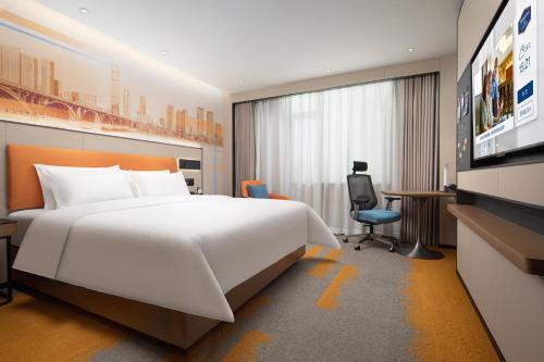 Imagen de la habitación del Hotel Hampton by Hilton Changsha Wuyi Square. Foto 14