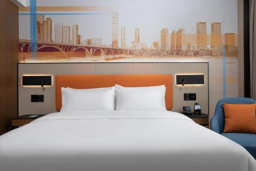 Imagen de la habitación del Hotel Hampton by Hilton Changsha Wuyi Square. Foto 15