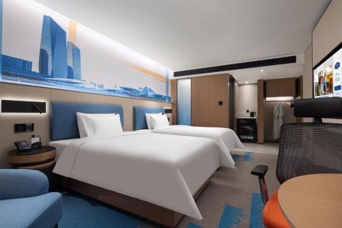 Imagen de la habitación del Hotel Hampton by Hilton Changsha Wuyi Square. Foto 17
