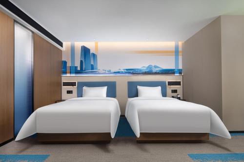 Imagen de la habitación del Hotel Hampton by Hilton Changsha Wuyi Square. Foto 19