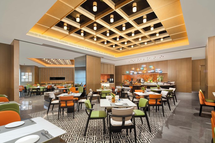 Imagen del bar/restaurante del Hotel Hampton by Hilton Guangzhou Changlong Wanbo Center. Foto 2