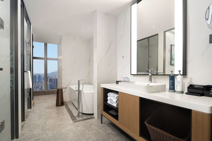 Imagen de la habitación del Hotel Hampton by Hilton Guangzhou Changlong Wanbo Center. Foto 4