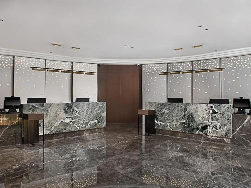 Imagen general del Hotel Hampton by Hilton Guangzhou Railway Station. Foto 6