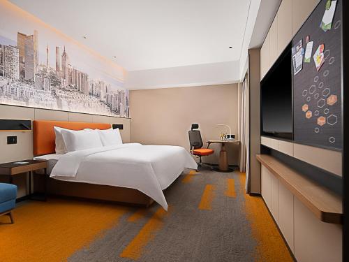 Imagen de la habitación del Hotel Hampton by Hilton Guangzhou Railway Station. Foto 10
