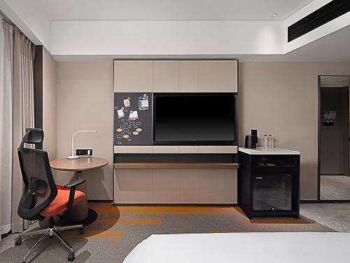Imagen de la habitación del Hotel Hampton by Hilton Guangzhou Railway Station. Foto 15