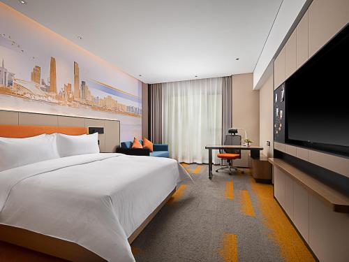 Imagen de la habitación del Hotel Hampton by Hilton Guangzhou Railway Station. Foto 17
