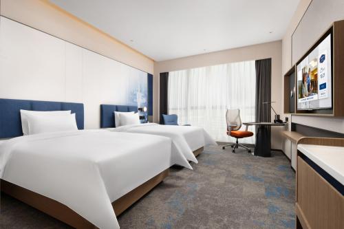Imagen de la habitación del Hotel Hampton by Hilton Guangzhou Renhe Baiyun Airport-Free Shuttle Bus During The Canton Fair. Foto 15