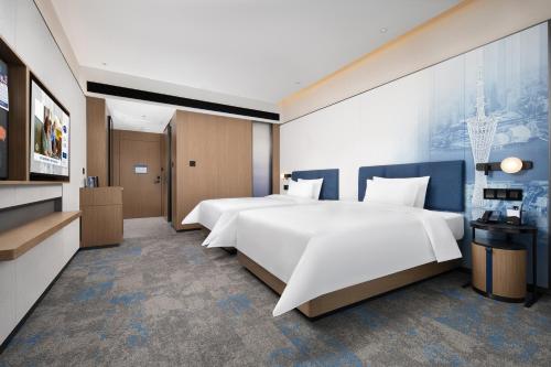Imagen de la habitación del Hotel Hampton by Hilton Guangzhou Renhe Baiyun Airport-Free Shuttle Bus During The Canton Fair. Foto 17