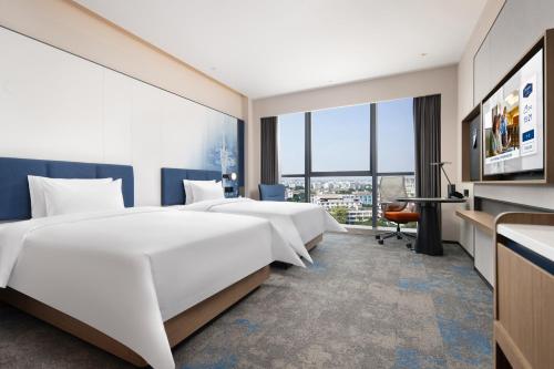 Imagen de la habitación del Hotel Hampton by Hilton Guangzhou Renhe Baiyun Airport-Free Shuttle Bus During The Canton Fair. Foto 18