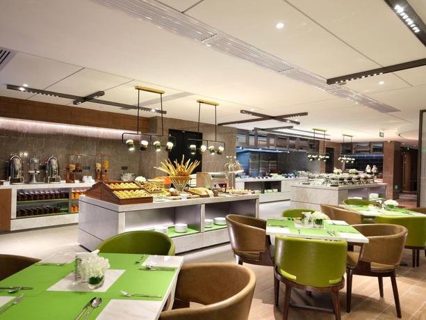 Imagen de los interiores del Hotel Hampton by Hilton Guangzhou Tianhe Sports Center. Foto 5