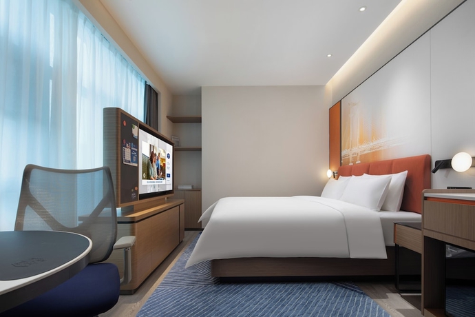 Imagen de la habitación del Hotel Hampton by Hilton Jinjiang Airport. Foto 4
