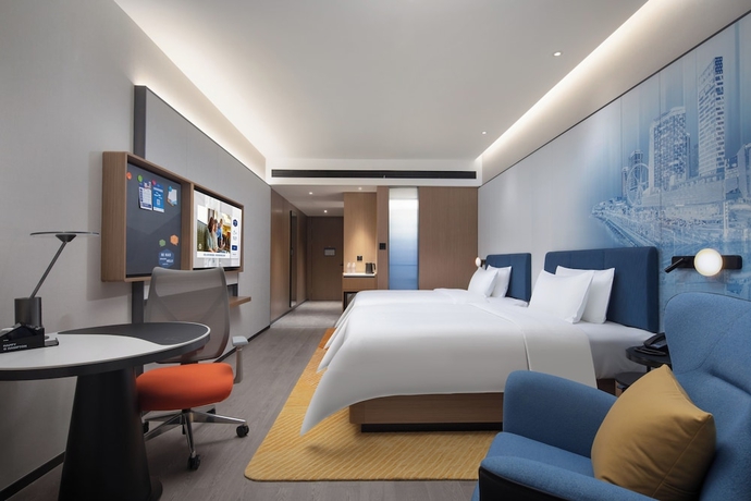 Imagen de la habitación del Hotel Hampton by Hilton Jinjiang Airport. Foto 6