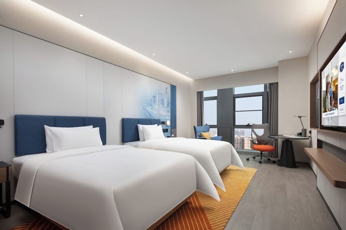 Imagen de la habitación del Hotel Hampton by Hilton Jinjiang Airport. Foto 7