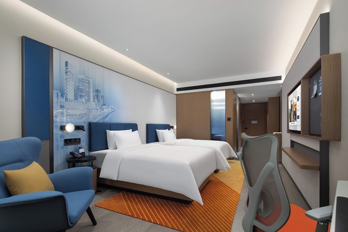 Imagen de la habitación del Hotel Hampton by Hilton Jinjiang Airport. Foto 10