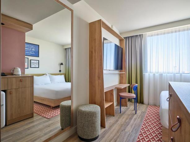 Imagen de la habitación del Hotel Hampton by Hilton Lyon Airport. Foto 7