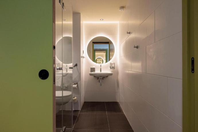 Imagen de la habitación del Hotel Hampton by Hilton Lyon Airport. Foto 12