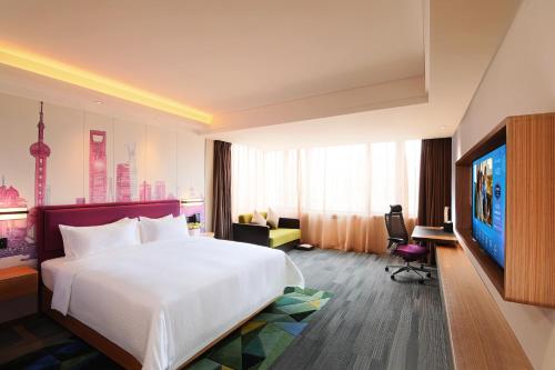 Imagen de la habitación del Hotel Hampton by Hilton Shanghai Hongqiao NECC. Foto 14