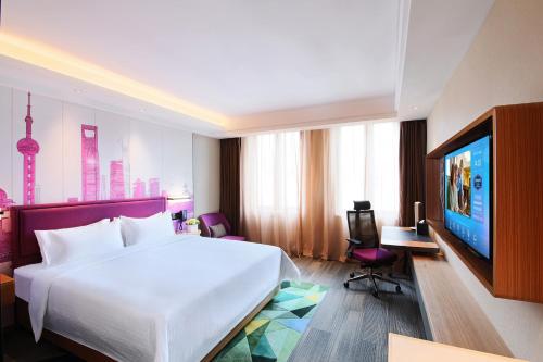 Imagen de la habitación del Hotel Hampton by Hilton Shanghai Hongqiao NECC. Foto 15
