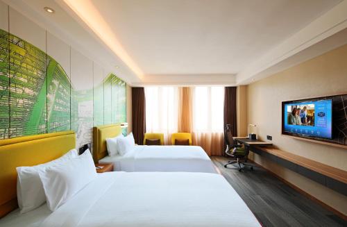 Imagen de la habitación del Hotel Hampton by Hilton Shanghai Hongqiao NECC. Foto 16